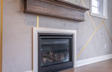 build in fireplace and shelve in custom family room
